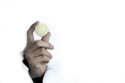 Bitcoin in the hand on a white background. Stock Photos