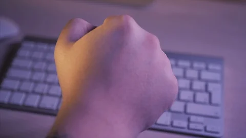 Bitcoin in the hands on the keyboard background Stock Footage 87328975