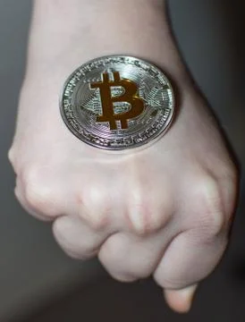 Bitcoin in hands Stock Photos