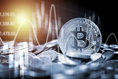 Bitcoin on heap of coins with technical graph and chart, Digital currency Stock Photos