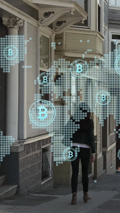 Bitcoin icons over world map against read view of a woman walking on the street Stock Footage 322955537