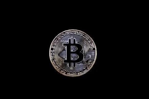 Bitcoin isolate on black background. Cryptocurrency digital money Concept Stock Photos
