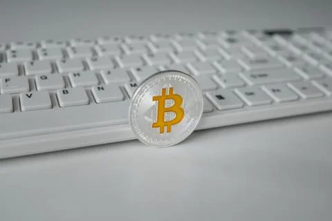 Bitcoin on keyboard background . BTC. cryptocurrency symbol Stock Photos