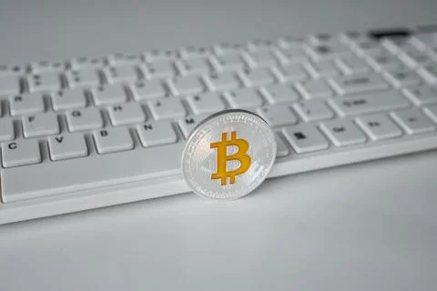 Bitcoin on keyboard background . BTC. cryptocurrency symbol Stock Photos