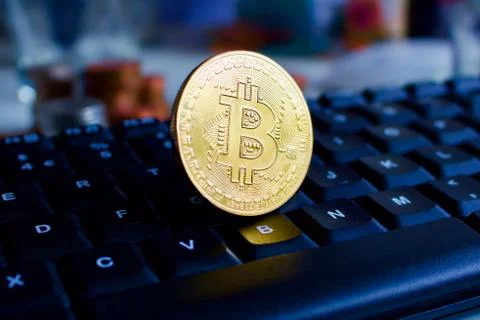 Bitcoin on keyboard Stock Photos