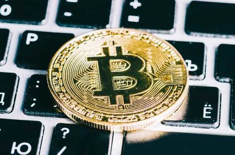 Bitcoin On Laptop Stock Photos