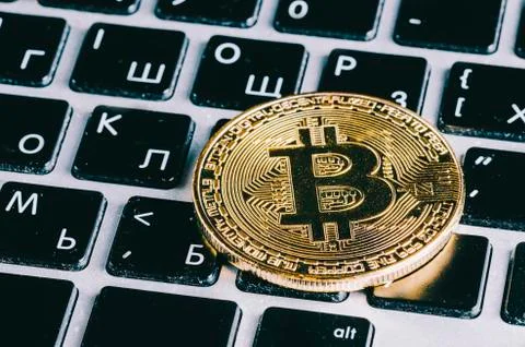 Bitcoin On Laptop Stock Photos