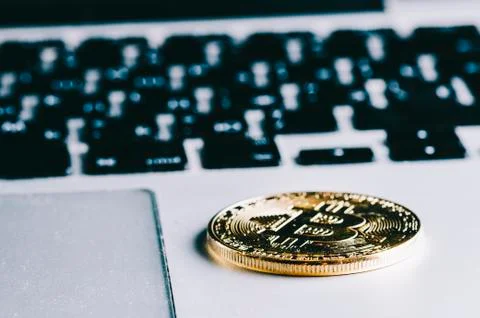 Bitcoin On Laptop Stock Photos