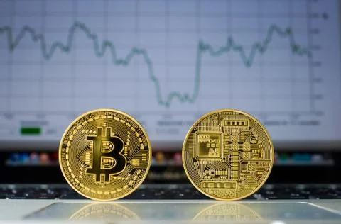 Bitcoin on laptop Stock Photos