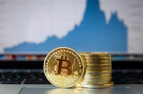 Bitcoin on laptop Stock Photos