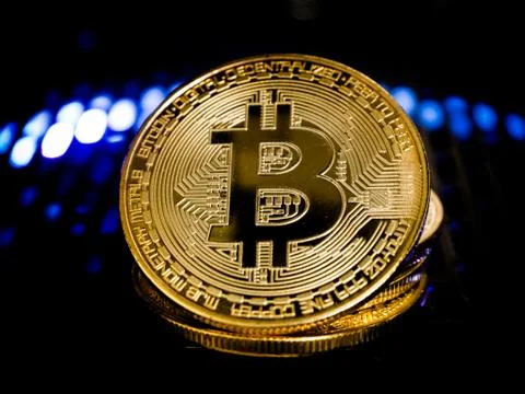 Bitcoin is located on the Power Supply with backlight concept. Stock Photos