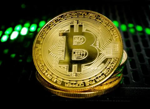 Bitcoin is located on the Power Supply with backlight concept. Stock Photos
