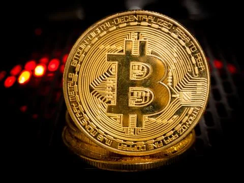 Bitcoin is located on the Power Supply with backlight concept. Stock Photos