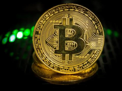 Bitcoin is located on the Power Supply with backlight concept. Stock Photos