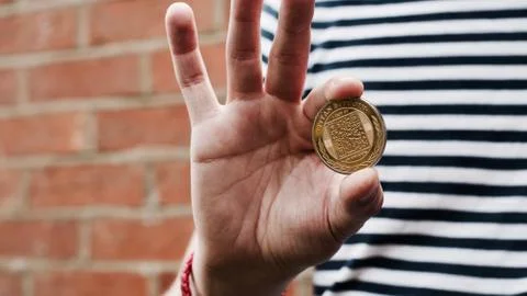 Bitcoin in man hand Stock Photos