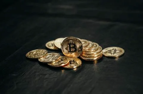 Bitcoin in a man's hand Stock Photos