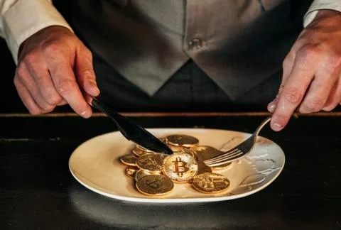 Bitcoin in a man's hand Stock Photos