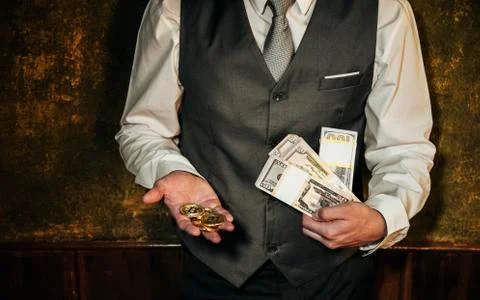 Bitcoin in a man's hand Stock Photos
