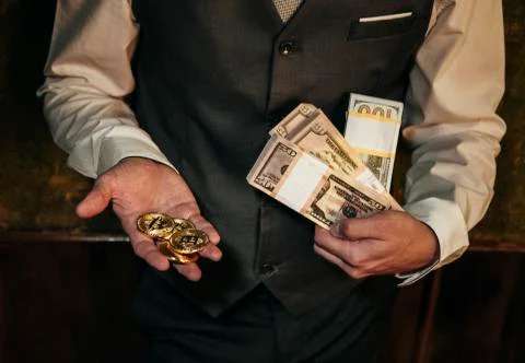 Bitcoin in a man's hand Stock Photos