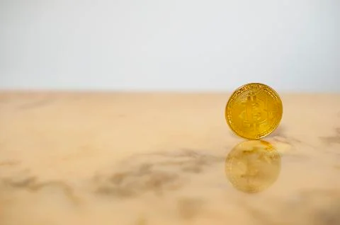 Bitcoin on marble background Stock Photos