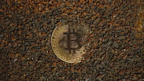 Bitcoin Mining Concept, Rocks Explode Outwards in Slow Motion, Revealing a Stock Footage 296390063