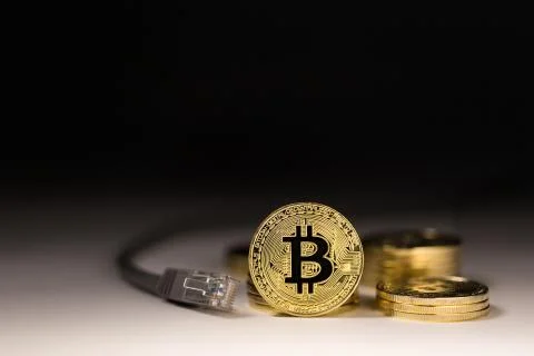 Bitcoin Mining, Digital, Network - Stacked Coins with ADSL Lead to the Side 写真素材