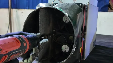 Bitcoin Mining Farm Maintenance: Technician Fixing Antminer S19 with Power Tool 스톡 동영상 323261878