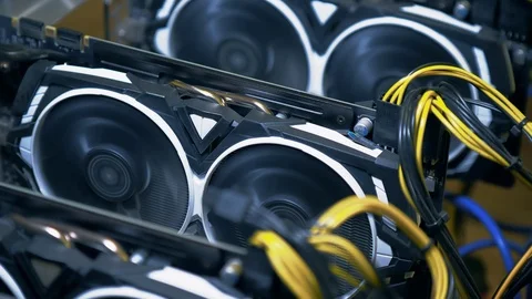 Bitcoin mining farm at work. Fans on video cards close-up  Stock Footage 122011865