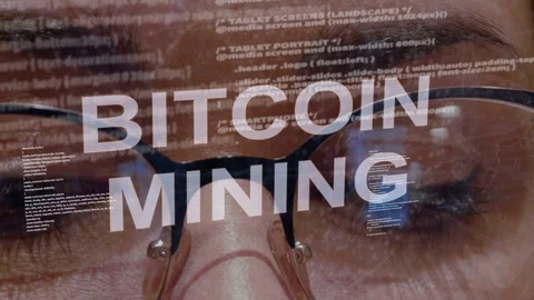 Bitcoin Mining text on background of female developer Stock Footage 106665163