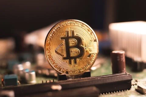 Bitcoin on the motherboard , computer hardware Stock Photos