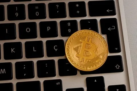 Bitcoin on a notebook Stock Photos