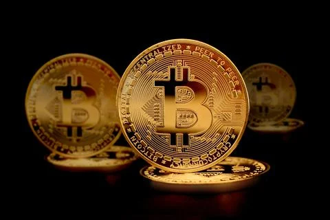 Bitcoin is an open source peer-to-peer electronic cash system that uses Stock Photos