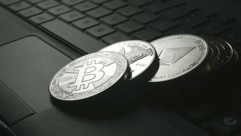 Bitcoin is an open source peer-to-peer electronic cash system that uses Stock Photos