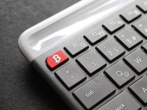 Bitcoin is an open source peer-to-peer electronic cash system that uses Stock Photos