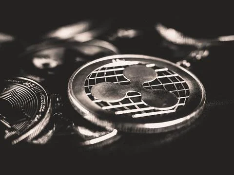 Bitcoin is an open source peer-to-peer electronic cash system that uses Stock Photos