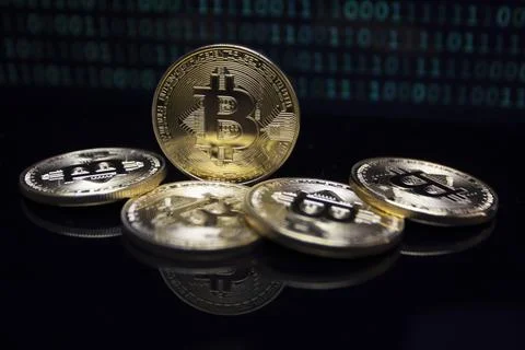 Bitcoin is an open source peer-to-peer electronic cash system that uses Stock Photos