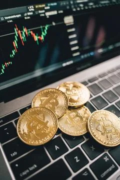 Bitcoin is an open source peer-to-peer electronic cash system that uses Stock Photos