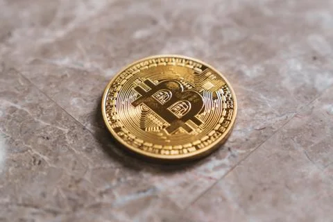 Bitcoin Physical Representation On Stone Background Stock Photos
