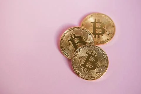 Bitcoin on pink background, cryptocurrency concept Stock Photos