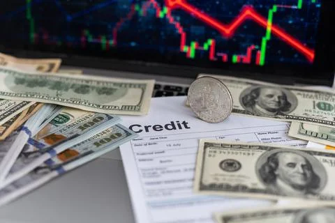 Bitcoin price is falling down and the entire crypto currency market is loosing Stock Photos