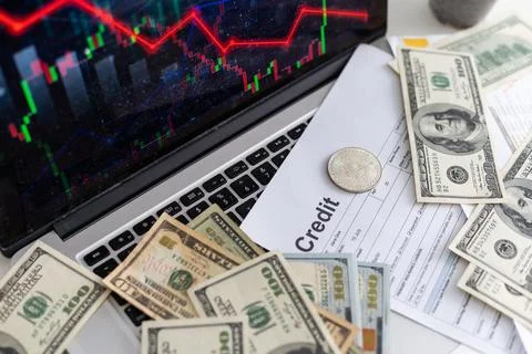 Bitcoin price is falling down and the entire crypto currency market is loosing Stock Photos