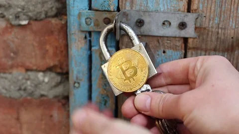 Bitcoin private keys. Closes the lock Stock Footage 83066106