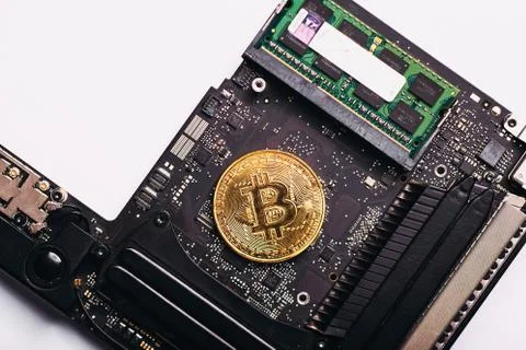 Bitcoin on a processor Stock Photos