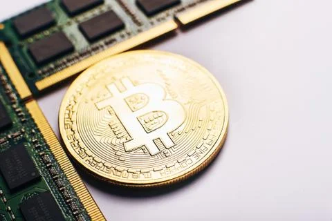 Bitcoin on a processor Stock Photos