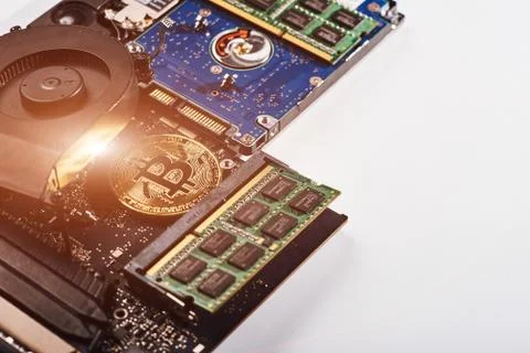 Bitcoin on a processor Stock Photos