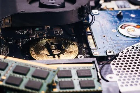 Bitcoin on a processor Stock Photos