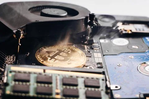 Bitcoin on a processor Stock Photos
