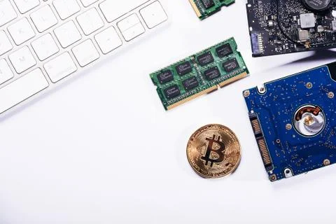 Bitcoin on a processor Stock Photos