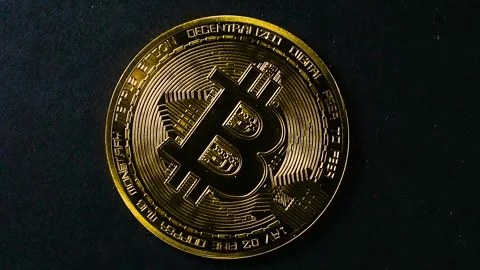 Bitcoin Rotating on Black Background close up Stock Footage 336362125