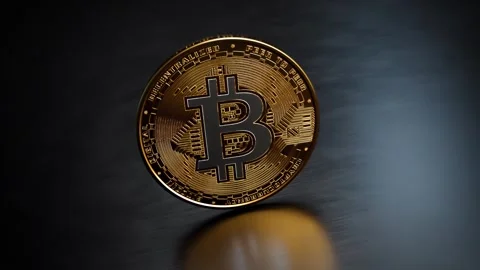 Bitcoin rotating coin close up on colored background, loop animation Stock Footage 264069288